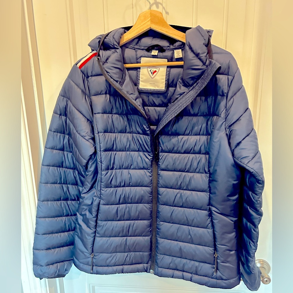 Rossignol Ski Puffer Jacket Navy Blue Women’s XL fits like Large.